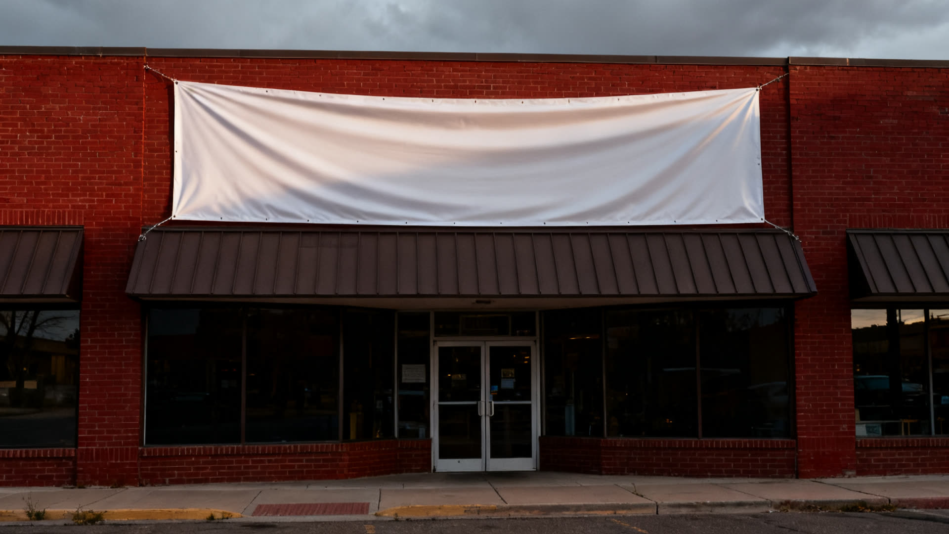 A finished storefront with its banner up